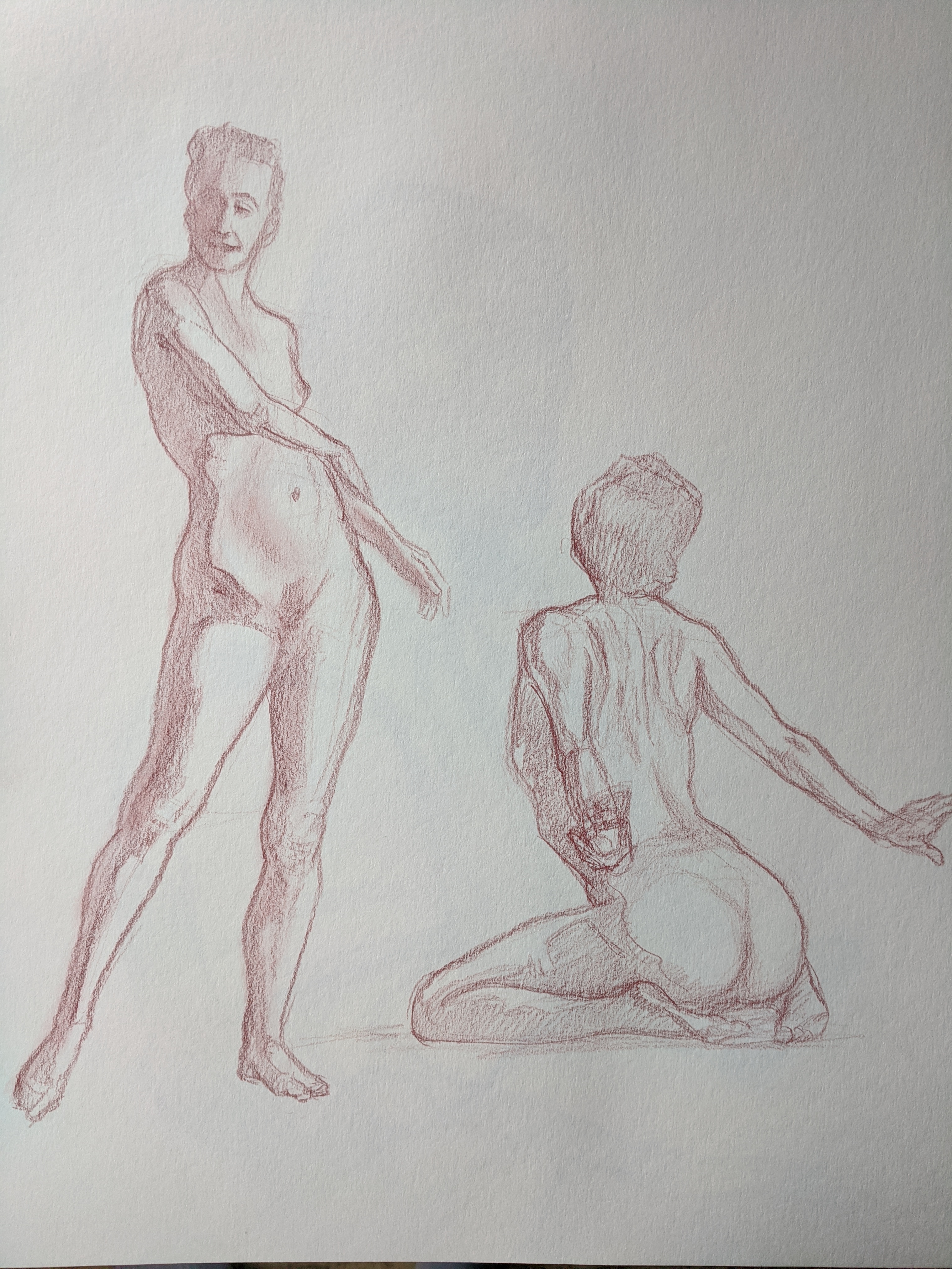 Red chalk page with front and back views of standing figures